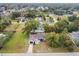 Charming single-story home featuring an attached garage and a lush, tree-filled yard in a quiet residential neighborhood at 8512 Longboat Ln, Hudson, FL 34667