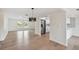 Open-concept living room and kitchen with stainless appliances and updated features throughout at 8512 Longboat Ln, Hudson, FL 34667