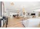 Open-concept living area with sleek hardwood floors, modern decor, and abundant natural light at 864 Mandalay Ave, Clearwater Beach, FL 33767