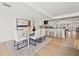 Bright, open floor plan with a dining area that flows into a modern kitchen at 864 Mandalay Ave, Clearwater Beach, FL 33767