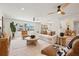 Open living space with hardwood floors, modern decor, and an abundance of natural light at 864 Mandalay Ave, Clearwater Beach, FL 33767