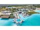 Aerial view of a tropical lagoon with various water structures, cabanas and lots of seating at 8720 Drummer Plank Dr, Wesley Chapel, FL 33545