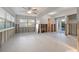 Open floor plan with view to the pool and natural light at 8801 Sunlit Cove Ne Dr, St Petersburg, FL 33702