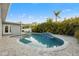 Sparkling pool surrounded by lush tropical landscaping and a beautiful patio area at 8801 Sunlit Cove Ne Dr, St Petersburg, FL 33702