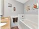 Bathroom featuring a soaking tub and a double sink vanity at 912 Channelside Dr # 2501, Tampa, FL 33602