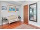 Modern condo entrance showing a comfortable chair and a decorative floor rug at 912 Channelside Dr # 2501, Tampa, FL 33602