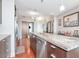 Well-designed kitchen featuring stainless appliances, granite counters, and wood flooring at 912 Channelside Dr # 2501, Tampa, FL 33602