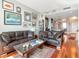 Inviting living room featuring hardwood floors and cozy, leather furniture at 912 Channelside Dr # 2501, Tampa, FL 33602