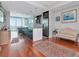 Open-concept living space features hardwood floors, kitchen with island, and water views at 912 Channelside Dr # 2501, Tampa, FL 33602