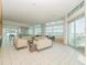 A spacious community lounge has comfortable seating and ample light at 912 Channelside Dr # 2501, Tampa, FL 33602