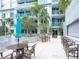 The patio features stylish patio furniture and tropical landscaping at 912 Channelside Dr # 2501, Tampa, FL 33602