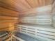 Relaxing sauna room features cedar wood walls, ceiling, and benches at 912 Channelside Dr # 2501, Tampa, FL 33602
