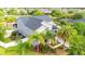 Aerial view of a home featuring a large lot with mature trees and manicured landscaping at 9607 Orange Jasmine Way, Tampa, FL 33647