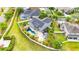 A sprawling backyard with a private pool oasis, rock features, and outdoor gazebo for entertaining at 9607 Orange Jasmine Way, Tampa, FL 33647