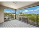 Screened balcony overlooking a beautiful view with waterfall feature at 9607 Orange Jasmine Way, Tampa, FL 33647