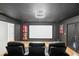 Home theater features include a large screen and comfortable seating at 9607 Orange Jasmine Way, Tampa, FL 33647