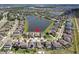 Charming neighborhood with many houses and a beautiful lake at 10008 Celtic Ash Dr, Ruskin, FL 33573
