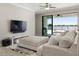 Bright living room showcases outdoor views with sliding glass doors that lead to the patio and beyond at 10008 Celtic Ash Dr, Ruskin, FL 33573