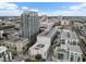 View of the neighborhood featuring various mid-rise and high-rise buildings and a pool at 101 N 12Th St # 206, Tampa, FL 33602