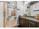Well-lit bathroom features granite counters, modern fixtures, and a shower-tub combination at 101 N 12Th St # 206, Tampa, FL 33602