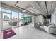 Modern indoor lounge with comfortable seating, dining area, and city views at 101 N 12Th St # 206, Tampa, FL 33602