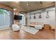 Living room with hardwood floors, exposed ceilings and neutral-toned furniture, creating a cozy atmosphere at 101 N 12Th St # 206, Tampa, FL 33602