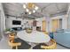 Modern living room with concrete ceilings, open floorplan, bar, and stylish furnishings at 101 N 12Th St # 206, Tampa, FL 33602