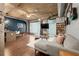 Contemporary living space with hardwood floors, exposed ceilings, an open layout and comfortable furniture at 101 N 12Th St # 206, Tampa, FL 33602