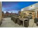 Spacious outdoor patio with a dining table and lounge furniture with an amazing city view at 101 N 12Th St # 206, Tampa, FL 33602