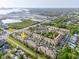 Scenic aerial view of the townhome complex, with beautiful bay views at 11260 Kapok Grand Cir, Madeira Beach, FL 33708