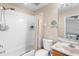 Neutral bathroom features a shower-tub combination and marble sink at 11260 Kapok Grand Cir, Madeira Beach, FL 33708