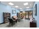 Community sitting area with comfortable seating, bookshelves, and natural light at 11260 Kapok Grand Cir, Madeira Beach, FL 33708