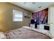 Bedroom with decor, ceiling fan, and a window offering natural light at 11487 80Th Ave, Seminole, FL 33772