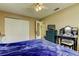 Bedroom with tile floors, a ceiling fan, closet, and vanity at 11487 80Th Ave, Seminole, FL 33772