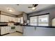 Bright kitchen with sleek appliances, countertops, and breakfast bar at 11487 80Th Ave, Seminole, FL 33772