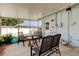 Covered outdoor patio with seating, with access to the yard at 11487 80Th Ave, Seminole, FL 33772