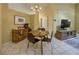 Inviting dining area with round table and modern chandelier, perfect for intimate meals and gatherings at 12024 Stone Crossing Cir, Tampa, FL 33635