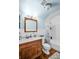 Traditional bathroom featuring a vanity with marble countertop and a shower at 1226 Serpentine S Dr, St Petersburg, FL 33705