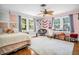Cheerful bedroom with cozy decor and a functional workspace at 1226 Serpentine S Dr, St Petersburg, FL 33705