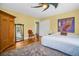 Comfortable bedroom featuring a large bed, stylish decor and a large window at 1226 Serpentine S Dr, St Petersburg, FL 33705