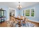 Charming dining room with hardwood floors and bright natural light at 1226 Serpentine S Dr, St Petersburg, FL 33705