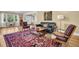 Inviting living room featuring hardwood floors and traditional decor at 1226 Serpentine S Dr, St Petersburg, FL 33705