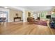 Elegant living room showcasing refinished wood floors and neutral-toned walls at 1226 Serpentine S Dr, St Petersburg, FL 33705