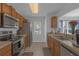 Well-equipped kitchen boasts stainless steel appliances and ample counter space at 12937 Trade Port Pl, Riverview, FL 33579