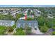 Aerial view of townhomes, showcasing well-manicured landscaping and a nearby residential neighborhood at 14649 Seminole Trl # 5, Seminole, FL 33776
