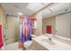 Bathroom featuring a shower/tub combination, single vanity, and updated hardware at 14649 Seminole Trl # 5, Seminole, FL 33776
