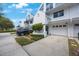 Charming townhouse with a one-car garage, well-maintained landscaping, and an inviting entrance at 14649 Seminole Trl # 5, Seminole, FL 33776