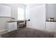 Versatile room featuring a Murphy bed, desk and ample storage at 16913 Clear Cork Dr, Wimauma, FL 33598