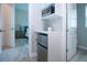 Modern kitchenette with mini fridge and microwave, perfect for guests at 16913 Clear Cork Dr, Wimauma, FL 33598