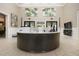 Inviting lobby area with a modern reception desk, stylish decor, and comfortable seating at 16913 Clear Cork Dr, Wimauma, FL 33598
